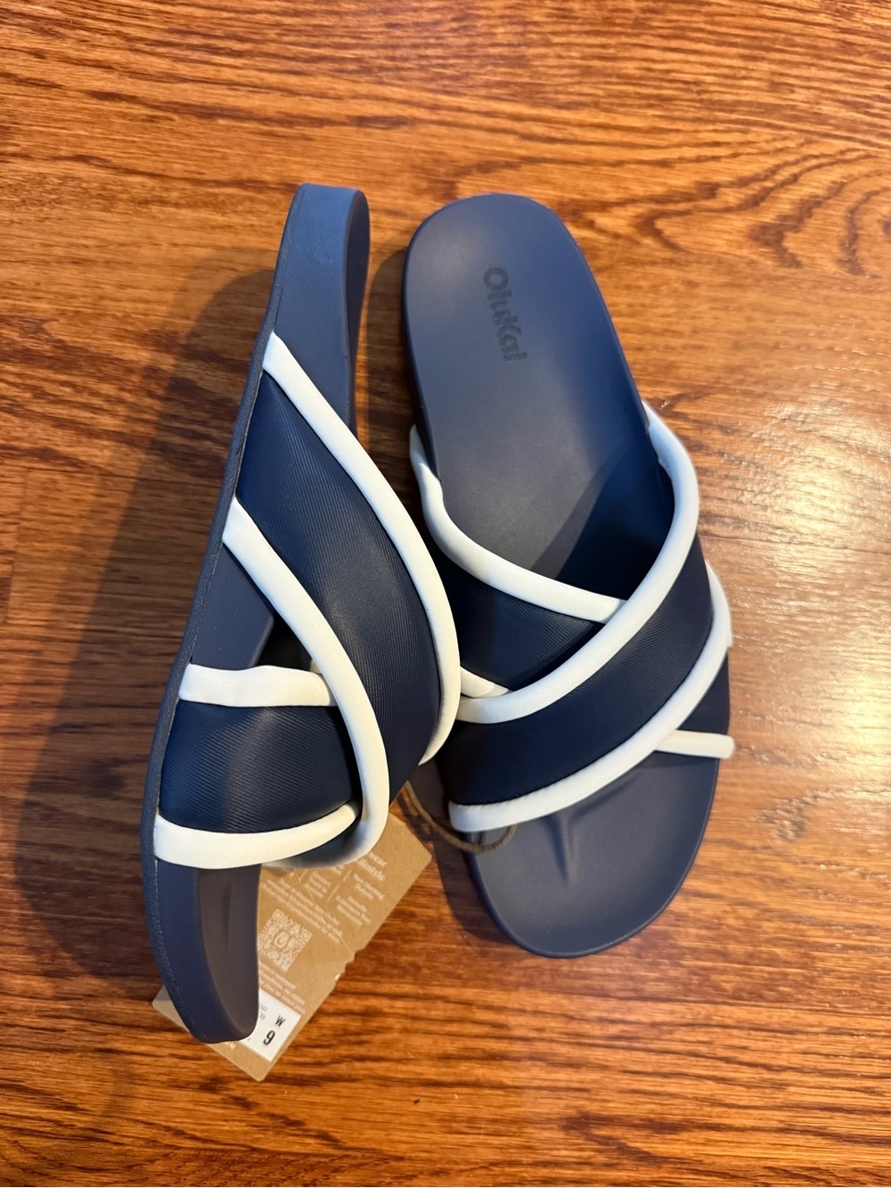 OluKai Navy and White Crisscross Slide Sandals